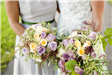 Bridal Party Members Holding Bouquets