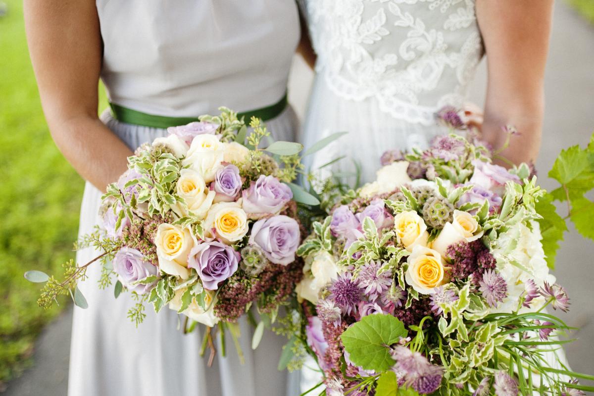 Bridal Party Members Holding Bouquets