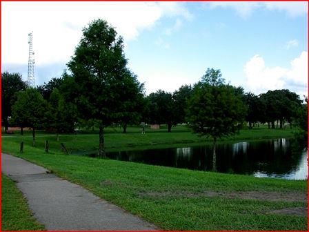 Paved Path Next to Pond